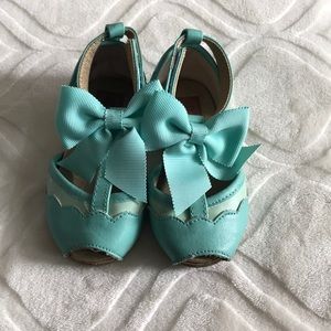 Soft aqua colored toddler dress shoes